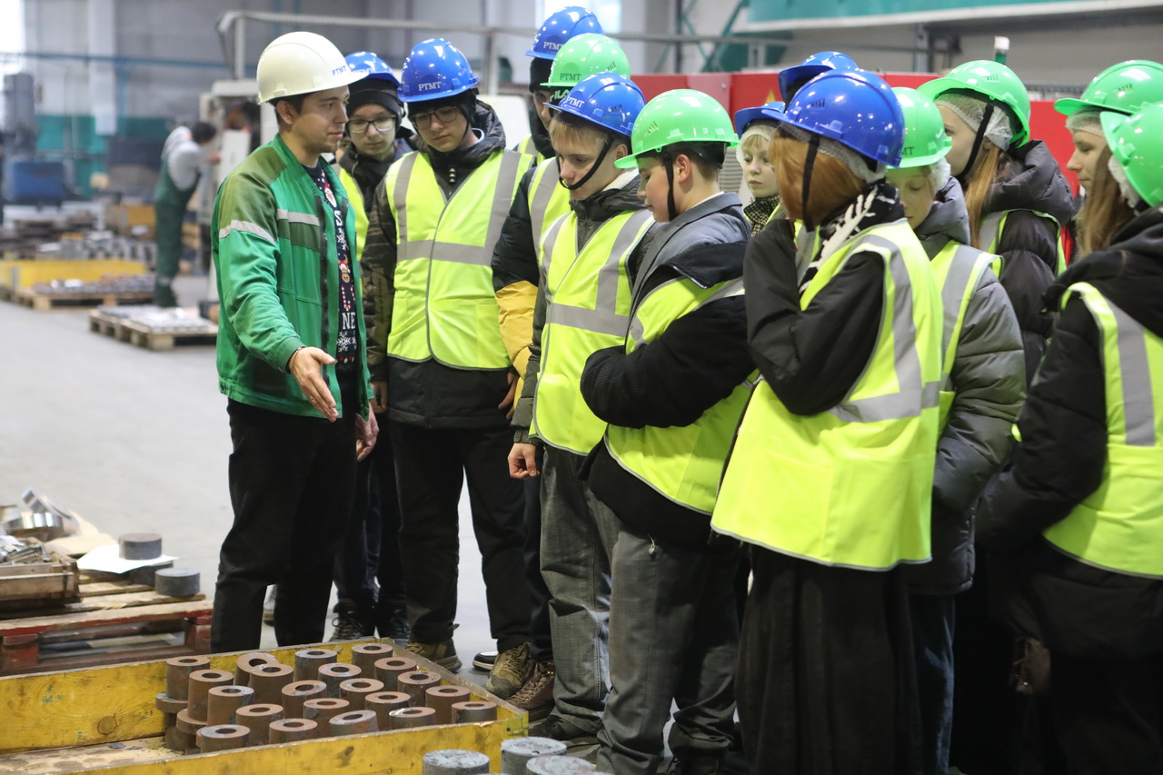 Schoolchildren at rebar builders