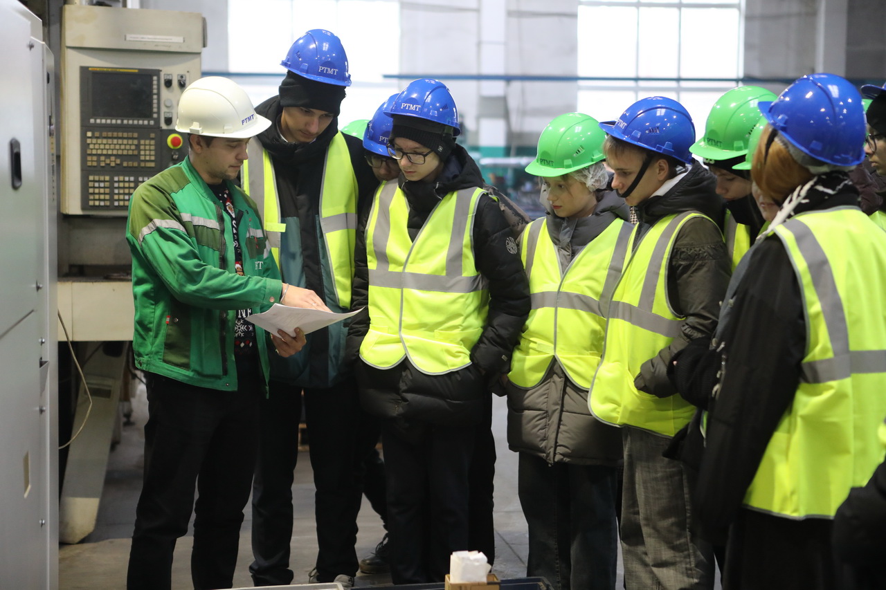 Schoolchildren at rebar builders
