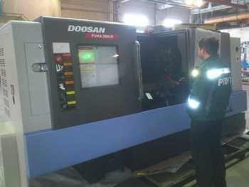 Another CNC lathe from Doosan (Korea) is preparing to take its place in the production of pipeline fittings